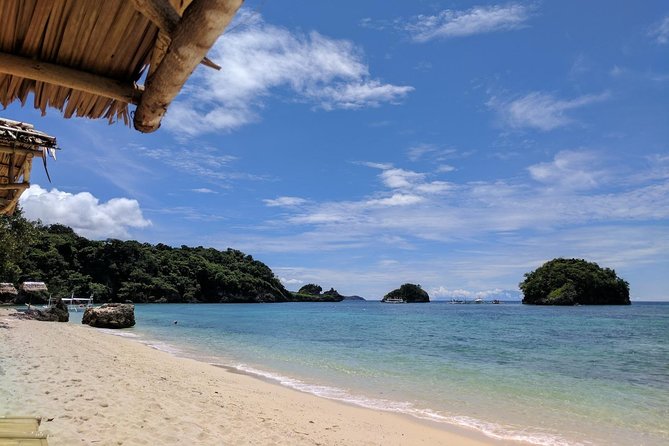 Boracay Island Hopping + Hot Kawa + Parasailing + Helmet Diving - Crystal Cove and Magic Island: tempting extras