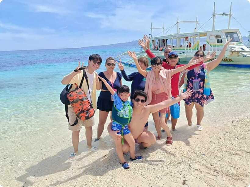 Boracay: Parasailing, Island Hopping, ATV Ride and Kawa Bath - Parasailing gives the day its best lift