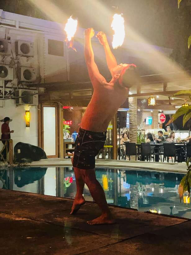 Borocay: Fire Dancing Show at Red Coconut Beach Hotel - What your 15 minutes looks like