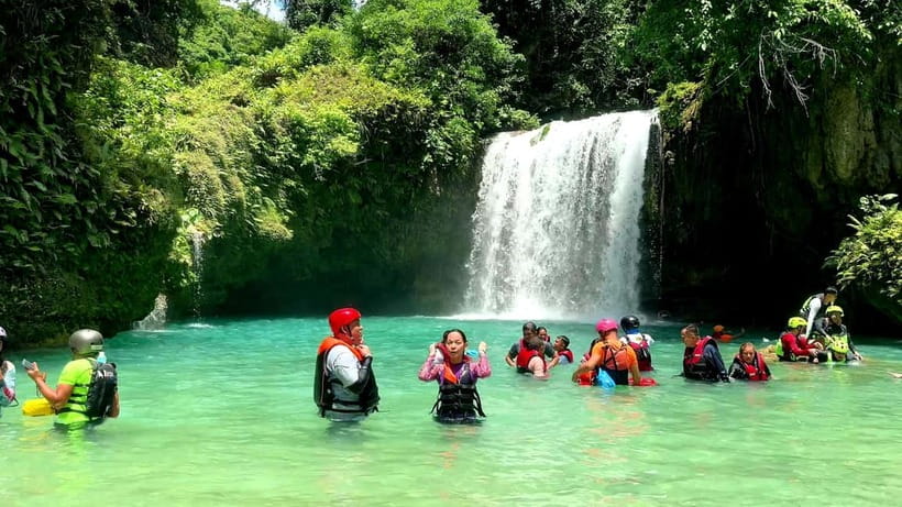 Cebu: Kawasan Falls Canyoneering & Zipline Experience - Walking, swimming, and jumping through Badian