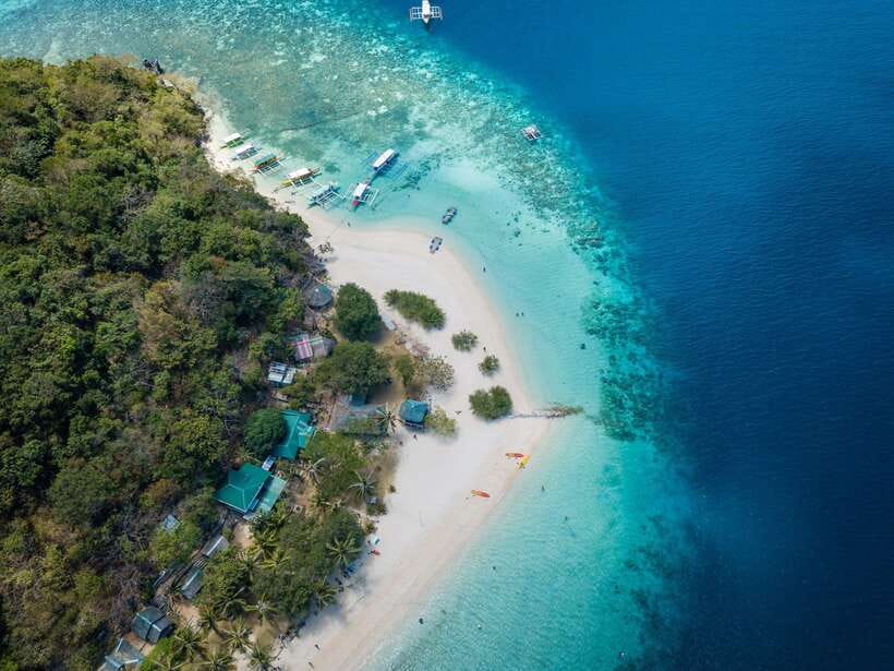 Coron: Coastal Cliffs, Beach & Malcapuya Island Hopping Tour - Three island stops, three different moods