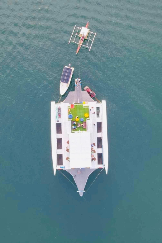 Coron Island: Premier Trimaran Tour - Banul Beach for lunch, snorkeling, and a break