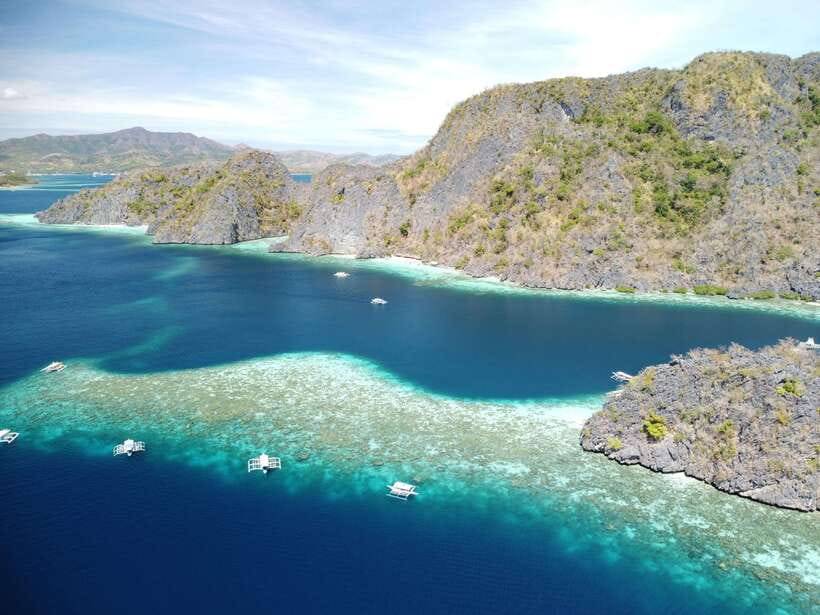Coron: Island Tour B w/ Snorkeling & Lagoon Adventures - Twin Lagoon and the narrow swim-through