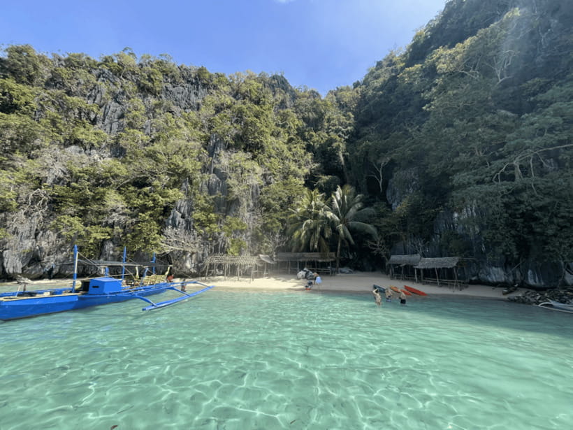 Coron: Private Boat Hire with Guided Tour and Lunch on Beach - Coral gardens, beaches, and time in the water
