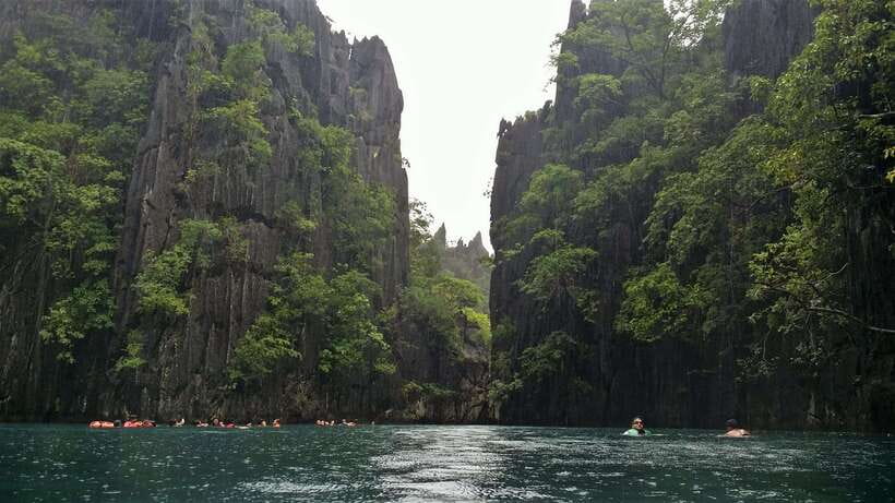 Coron Tour A: Kayangan Lake & Quin Reef Tour with Lunch - Sunset Beach and the picnic lunch