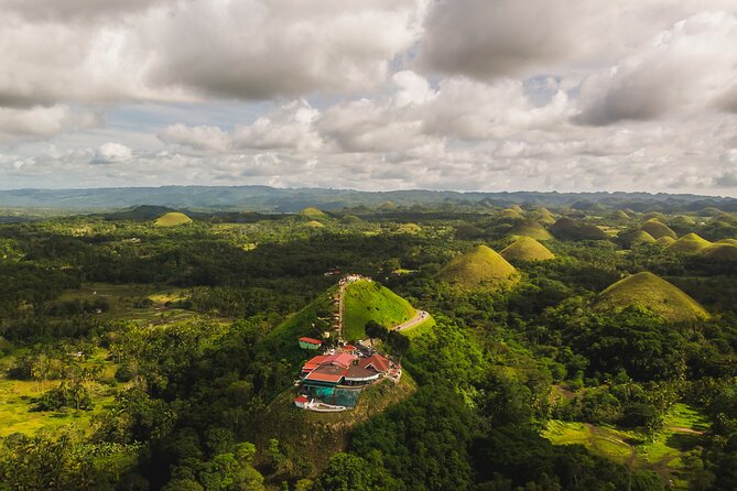 Famous Bohol Chocolate Hills Loboc River Cruise Tarsier Tour - Bilar Man-Made Forest