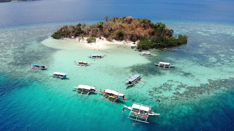 From Coron: Island Hopping Boat Day Trip with Buffet Lunch - A full day on Coron’s classic water route