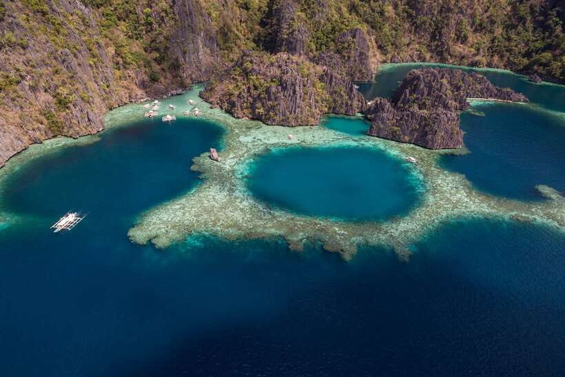 From Coron: Island Hopping Boat Day Trip with Buffet Lunch - Kayangan Lake and its clear mountain water
