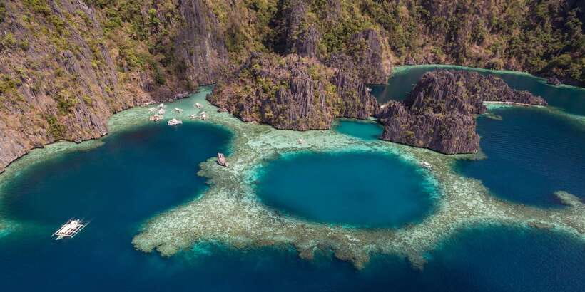 From Coron: Island Hopping Boat Day Trip with Buffet Lunch - Twin Lagoon, where two water worlds meet