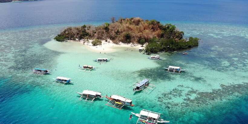 From Coron: Island Hopping Boat Day Trip with Buffet Lunch - Skeleton Wreck and Reef Garden snorkeling