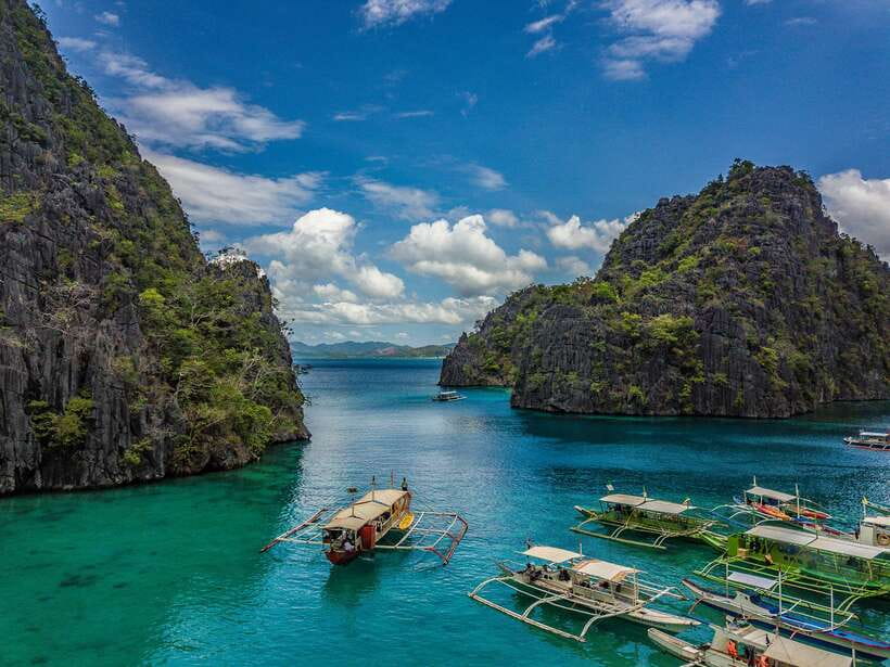 From Coron: Island Hopping Boat Day Trip with Buffet Lunch - CYC Beach, Sunset Beach, and the flexible stop list