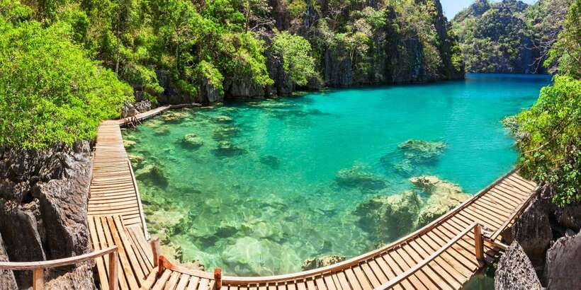 From Coron: Island Hopping Boat Day Trip with Buffet Lunch - A hot buffet lunch served on the beach