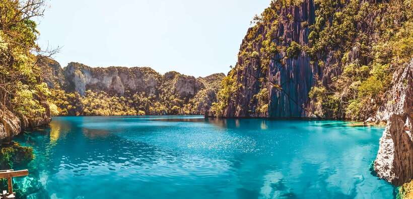 From Coron: Island Hopping Boat Day Trip with Buffet Lunch - What the guide and boat service add