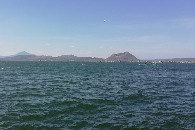 From Manila: Amazing Taal Volcano Island Boat Lake Tour w/ Guide - The boat ride on Taal Lake