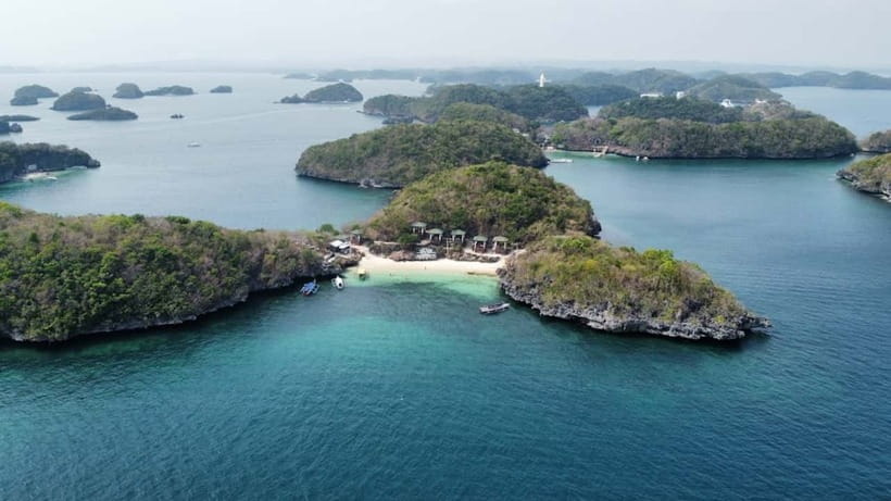 From Manila: Pangasinan Hundred Islands Guided Tour - Reaching Alaminos and boarding the island boat