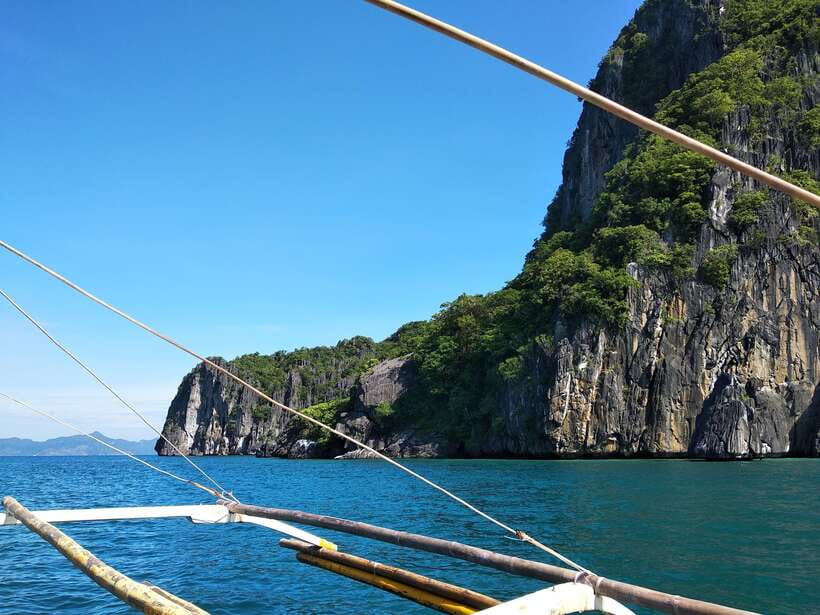 From Puerto Princesa: Day Trip to El Nido and Island Hopping - Seven Commandos Beach and its coconut-lined shore