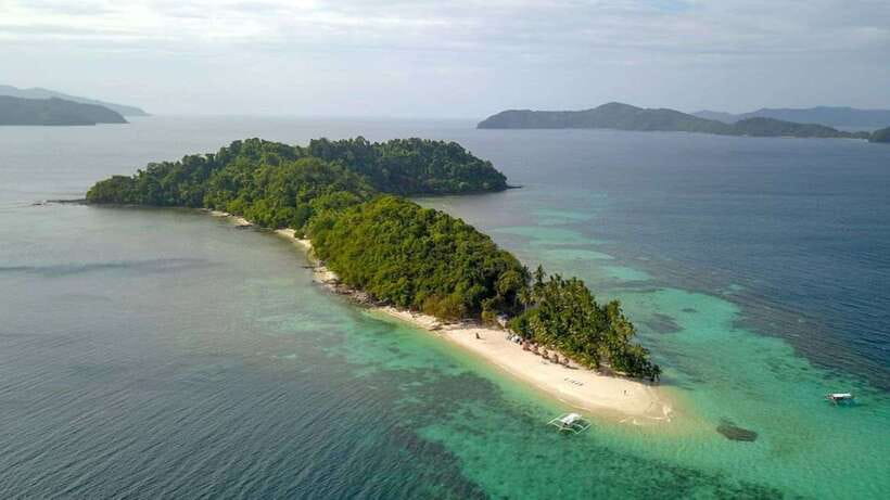 From Puerto Princesa: Port Barton & Island Hopping Day Trip - The first swim at Turtle Spot