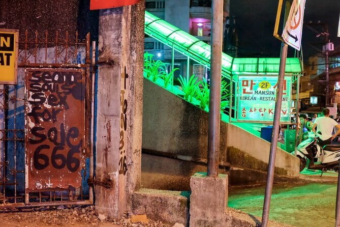 Manila Social and Political Walk - P Burgos Street and the city after dark