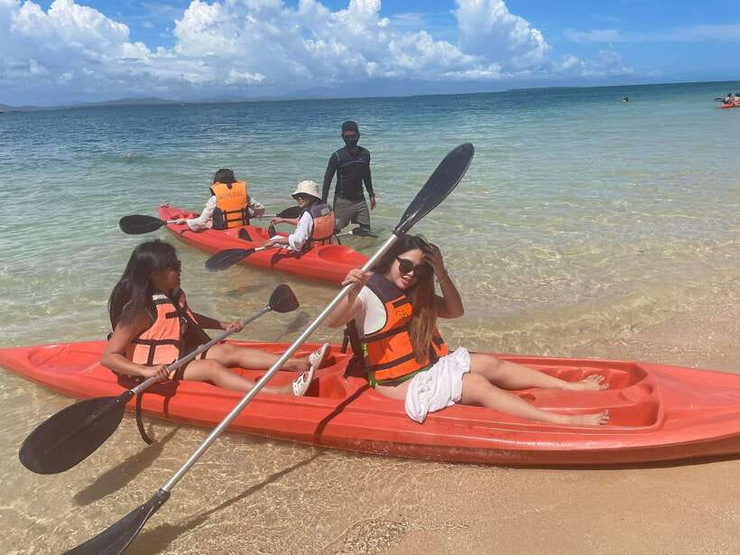 Puerto Princesa: Honda Bay Tour with Lunch - Luli Island: sand, shallow water, and an easy first stop