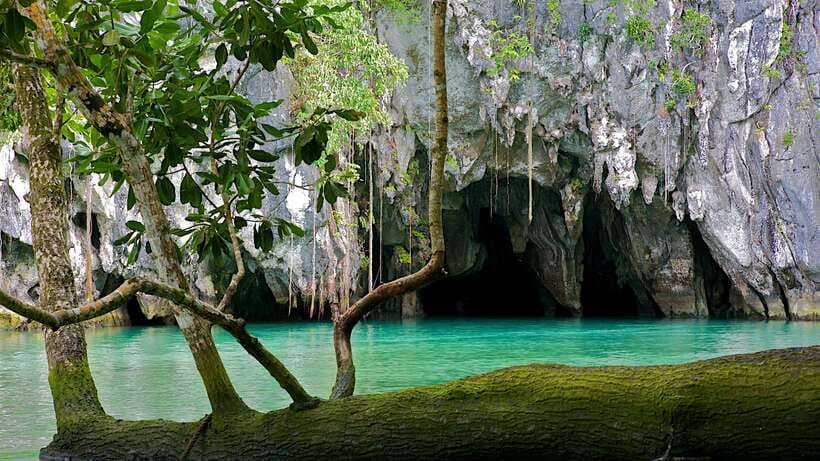 Puerto Princesa: Underground River and Firefly Watching Tour - Crossing the water to the cave entrance