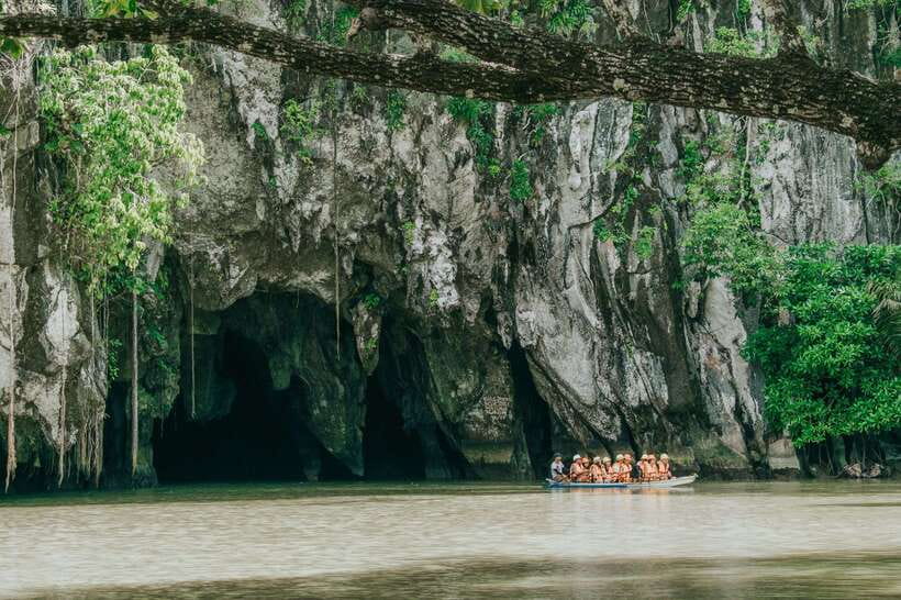 Puerto Princesa: Underground River, Zipline, Paddleboat Tour - A slow paddle through the mangroves