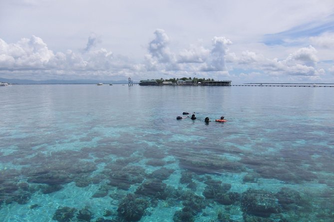 Twin Island Snorkeling Adventure at Hiltungan and Nalsuan - The boat ride from Cebu to the island sites